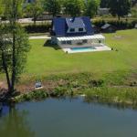 Wohnen am Motzener See / exkl. Villa mit Wassergrundstück, Pool und eigenem Steg