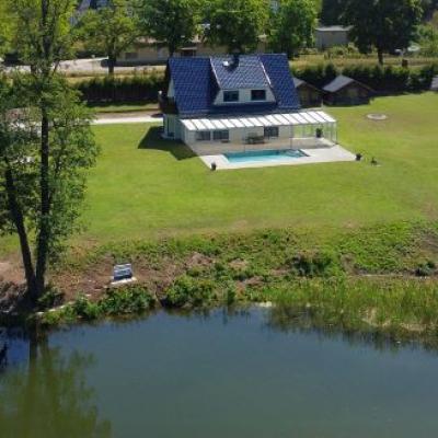 Wohnen am Motzener See / exkl. Villa mit Wassergrundstück, Pool und eigenem Steg